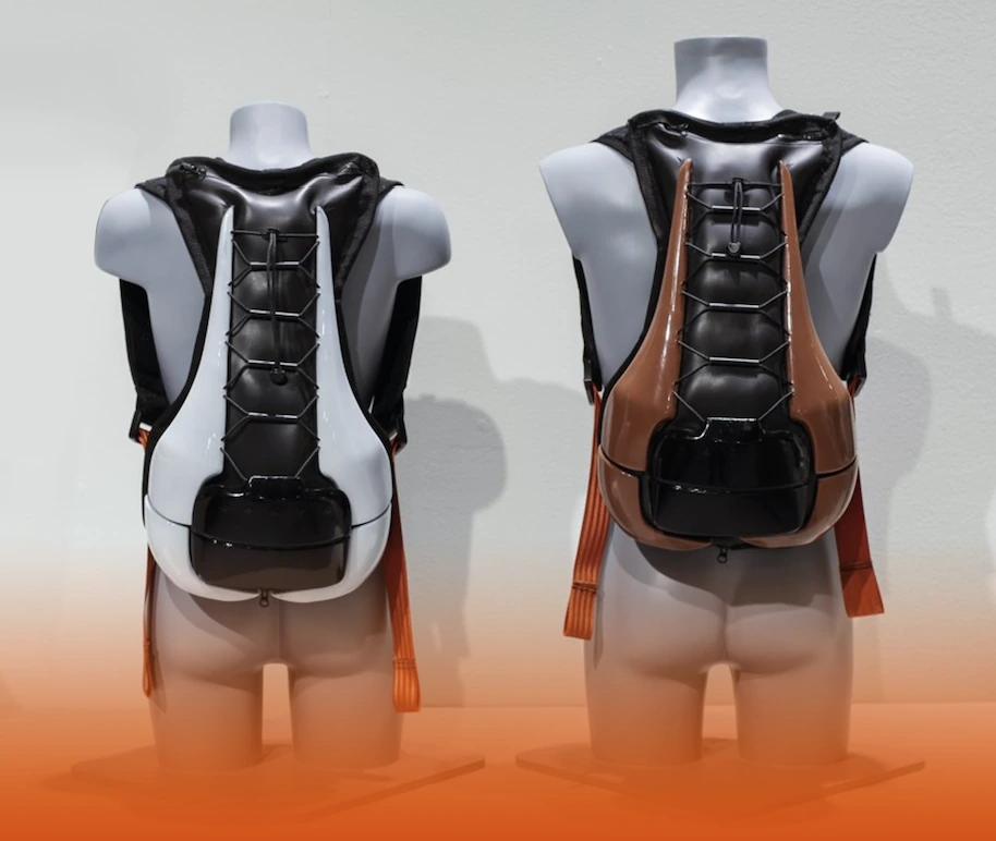 Two views of FleXC backpack prototypes displayed on mannequins